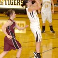 Lacey Beeks, Prairie Grove junior, pulls up to take a jumper Feb. 1 against Gentry. Beeks scored 19 ...