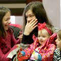 Kayla Por, 12, from left, and her sisters Kelsey, 14, Kylie, 1, and Hailey, 7, enjoy the activities ...