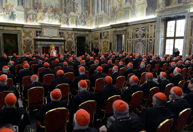 in-this-photo-provided-by-the-vatican-newspaper-losservatore-romano-pope-benedict-xvi-top-center-delivers-his-message-on-the-occasion-of-his-farewell-meeting-to-cardinals-at-the-vatican-on-thursday-feb-28-2013-benedict-xvi-promised-his-unconditional-reverence-and-obedience-to-his-successor-in-his-final-words-to-his-cardinals-thursday-a-poignant-farewell-before-he-becomes-the-first-pope-in-600-years-to-resign