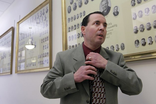 rep-andy-mayberry-r-hensley-straightens-his-tie-before-speaking-to-reporters-in-a-hallway-outside-the-senate-chamber-at-the-arkansas-state-capitol-in-little-rock-on-thursday-feb-28-2013-the-senate-voted-thursday-to-override-gov-mike-beebes-veto-of-mayberrys-bill-banning-most-abortions-starting-in-the-20th-week-a-day-after-the-state-house-voted-to-override-it