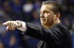 Kentucky coach John Calipari directs his team during the second half of an NCAA college basketball game at Rupp Arena in Lexington, Ky., Wednesday, Feb. 27, 2013. Kentucky defeated Mississippi State 85-55. (AP Photo/James Crisp)
