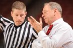 Arkansas coach Tom Collen speaks to an official during the second half against South Carolina Sunday, Jan. 27, 2013, in Bud Walton Arena.