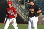 Arkansas' Dominic Ficociello watches from first base in the first inning of the Razorbacks' 3-1 loss to Arizona State on Saturday. Ficociello was one of six runners stranded in the game. 