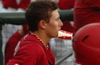Arkansas second baseman Dominic Ficociello watches from the dugout during the Razorbacks' 3-1 loss to Arizona State on Saturday.