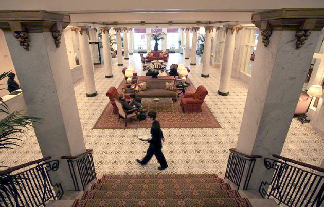 a-capital-hotel-employee-walks-through-the-ornate-lobby-area-of-the-downtown-little-rock-hotel-tuesday-afternoon-the-hotel-has-been-awarded-a-forbes-travel-guide-four-star-rating