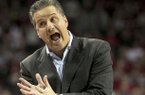 Kentucky's head coach John Calipari yells to his bench during the first half of an NCAA college basketball game against Arkansas in Fayetteville, Ark., Saturday, March 2, 2013. (AP Photo/Gareth Patterson)