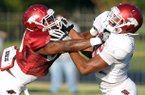 Arkansas redshirt freshman defensive end Deatrich Wise Jr. (right) was a high school teammate of Razorbacks recruit Jamal Adams.