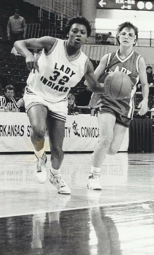 Sonja Tate scored 2,313 points for Arkansas State in 1990-1993 and played 10 seasons of professional basketball in Europe. 