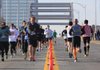 Runners cross the Broadway Bridge in both directions Sunday morning during the Little Rock Marathon. More photos are available at arkansasonline.com/galleries. 
