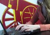 With her cell phone nearby, Mahrinah von Schlegel, managing director of Cibola, an incubator for tech entrepreneurs that will open this spring, checks a social-networking site at her office in Chicago. 