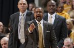 Missouri head coach Frank Haith argues a call in front of assistant coach Dave Leitao, left, and associate head coach Tim Fuller, right, during the second half of an NCAA college basketball game against Arkansas Tuesday, March 5, 2013, in Columbia, Mo. Missouri won the game 93-63. (AP Photo/L.G. Patterson)