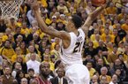 Missouri forward Laurence Bowers (21) dunks over Arkansas forward Marshawn Powell (33) in the second half of an NCAA college basketball game on Tuesday, March 5, 2013, at Mizzou Arena in Columbia, Mo. (AP Photo/St. Louis Post-Dispatch, Chris Lee)