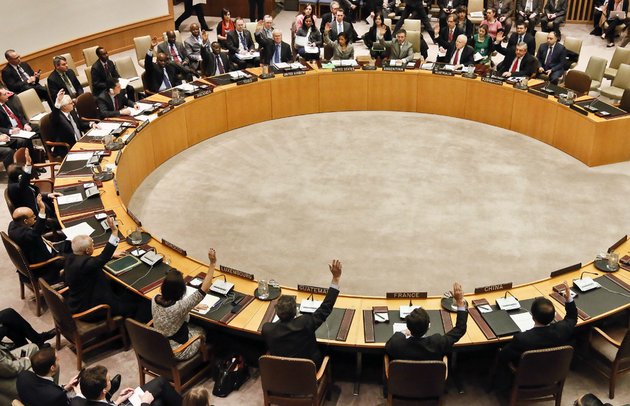 members-of-the-united-nations-security-council-vote-for-tough-new-sanctions-to-punish-north-korea-for-its-latest-nuclear-test-during-a-meeting-at-un-headquarters-thursday-march-7-2013-the-unanimous-vote-by-the-uns-most-powerful-body-sparked-a-furious-pyongyang-to-threaten-a-nuclear-strike-against-the-united-states