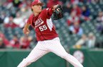 Arkansas pitcher Ryne Stanek fires a pitch in the second inning in the second inning of Friday night's baseball game against San Diego State at Baum Stadium in Fayetteville.