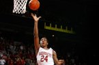 Arkansas freshman Michael Qualls drives to the basket against Texas A&M Saturday, March 9, 2013, at Bud Walton Arena in Fayetteville.