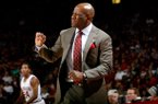 Arkansas head coach Mike Anderson signals to his players during the second half against Texas A&M on Saturday, March 9, 2013, at Bud Walton Arena.
