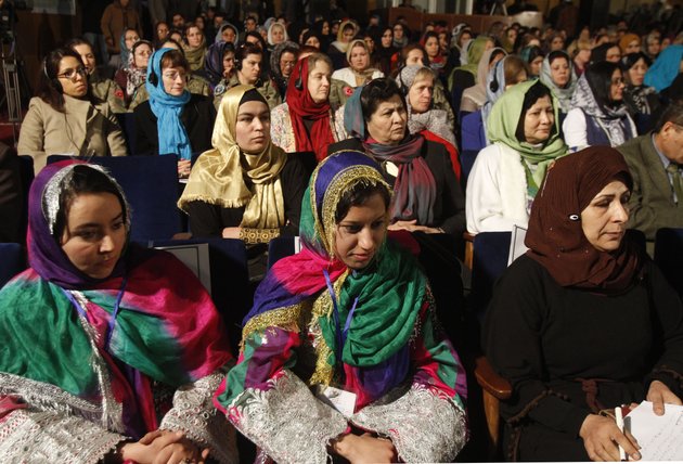 afghan-women-listen-to-afghan-president-hamid-karzai-deliver-a-nationally-televised-speech-about-the-state-of-afghan-women-in-kabul-afghanistan-sunday-march-10-2013-karzai-on-sunday-accused-the-taliban-and-the-us-of-working-in-concert-to-convince-afghans-that-violence-will-worsen-if-most-foreign-troops-leave-as-planned-by-the-end-of-next-year