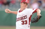 Arkansas starter Trey Killian delivers a pitch Friday, March 15, 2013, during the first inning of play against Ole Miss at Baum Stadium in Fayetteville.