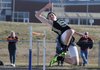 STAFF PHOTO SAMANTHA BAKER
Cole Butrynski (cq) of Bentonville High School attempts a 5-foot-8-inch high jump Thursday, March 14, 2013, at Tiger Athletic Complex during the Tiger Relays in Bentonville.