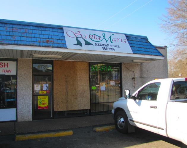 boards-cover-windows-shattered-by-gunfire-at-the-santa-maria-mexican-store-on-base-line-road-friday