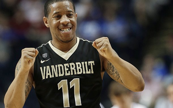 Vanderbilt guard Kyle Fuller (11) reacts in the closing seconds of the second half of an NCAA college basketball game against Kentucky at the Southeastern Conference tournament, Friday, March 15, 2013, in Nashville, Tenn. Vanderbilt won 64-48. (AP Photo/Dave Martin)