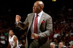 Arkansas head coach Mike Anderson signals to his players during the second half against Texas A&M on Saturday, March 9, 2013, at Bud Walton Arena in Fayetteville.