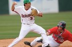 Arkansas second baseman Jacob Mahan (3) prepares to make the relay throw to first after forcing out Ole Miss designated hitter Will Allen Sunday, March 17, 2013, during the second inning of play at Baum Stadium.