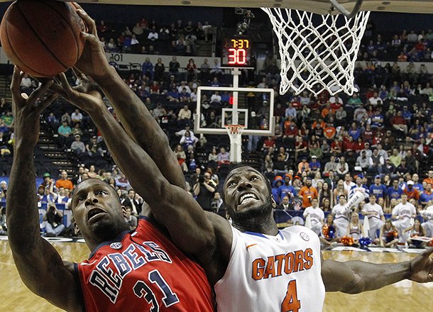 florida-center-patric-young-4-vies-for-a-rebound-with-mississippi-forward-murphy-holloway-31-during-the-first-half-of-an-ncaa-college-basketball-game-in-the-final-round-of-the-southeastern-conference-tournament-sunday-march-17-2013-in-nashville-tenn-ap-photojohn-bazemore