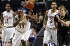 Arkansas's Marshawn Powell chases a blocked pass down court in front of Vanderbilt's Josh Henderson during their Southeastern Conference tournament game in Nashville Thursday.