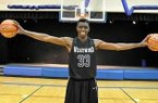 Junior forward Zylan Cheatman likes Arkansas' style of play. 
