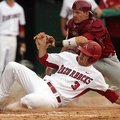 Arkansas' Jacob Mahan is tagged out at home by South Carolina catcher Grayson Greiner Sunday, May 6,...