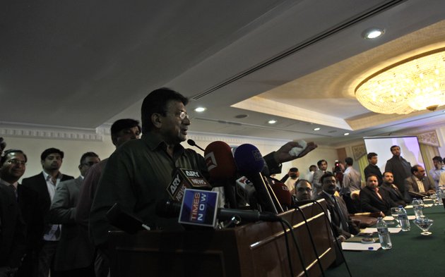 former-pakistani-president-pervez-musharraf-talks-to-his-party-members-during-a-ceremony-to-celebrate-pakistan-national-day-ahead-his-trip-to-karachi-on-sunday-in-dubai-united-arab-emirates-saturday-march-23-2013-musharraf-says-he-will-follow-through-with-his-plans-to-return-to-his-homeland-despite-risks-of-arrest-and-other-threats