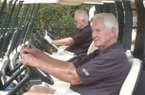 Former Arkansas Athletic Director Frank Broyles (left) and Pat Summerall prepare to head out for the start of the 2008 Pat Summerall Celebrity Classic at Chenal Country Club in Little Rock.
