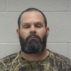 Shots fired into Bentonville club, man arrested