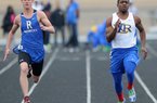 North Little Rock’s Kavin Alexander (right) won the boys 100 meters in a time of 10.56 seconds Thursday at the Class 7A track and field meet in Benton. Chase Lamers (left) of Rogers was third in 10.83. 