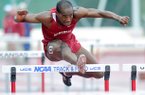 Arkansas hurdler Caleb Cross clears a hurdle in the 100 meter hurdles on April 27, 2013 during the Arkansas Team Invitational at John McDonnell Field in Fayetteville.