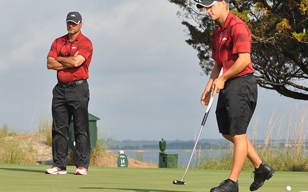 Arkansas coach Brad McMakin (left) believes his team will win the NCAA Regional at the Blessings golf course in Fayetteville. 
