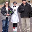 Bryana Carter was one of several seniors who were honored during parents’ night on Friday. Bryana is pictured with her parents. Seniors on the boys’ team were honored during their game as well. 