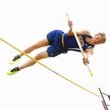 Decatur senior Evan Owens clears the bar in pole vault competition in Gravette earlier this season. Owens won the state championship at Ft. Smith on May 1 with a vault of 13 feet, 4 inches. 