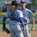 Chris Greear, right, and Austin Griffin, of Rogers High celebrate after winning the semifinals game ...