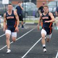 Alex Miles, left, and Daniel Spickes, both of Rogers Heritage, race side-by-side Wednesday during th...