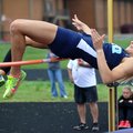 Payton Stumbaugh of Springdale Har-Ber clears the bar in the high jump Thursday afternoon during the...
