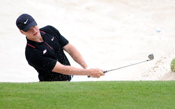 Arkansas sophomore Thomas Sorensen hits out of the sand on the fifth green during the opening round of the NCAA men's Regional Golf Tournament Thursday, May 16, 2013 at the Blessings Golf Club in Fayetteville.