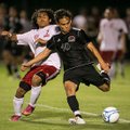 Springdale junior Roberto Castro (10) kicks the ball ahead of Fort Smith Northside senior Sergio Mar...