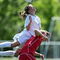 Siloam Springs senior Lesli Reyes goes over the back of Searcy Victoria Sanders going for the ball d...