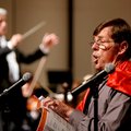 David Hunt, McNair Middle School coach, performs Friday as a toreador singing opera as Steven Byess,...
