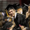 Colton Frost, a Bentonville graduate, smiles toward the audience Saturday during Bentonville High Sc...