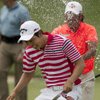 Korean hangs on, takes Nelson by 2