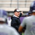 Keith Fimple, Fayetteville assistant coach and defensive coordinator, runs practice for the defense ...