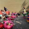 Fatima Pollard, right, and Jules Taylor lead a group of children in songs during the Block Street Bl...